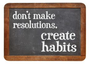 Do not make resolutions, create habits - advice on a vintage slate blackboard